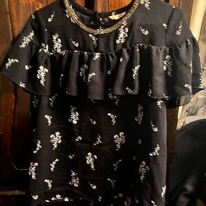 Stylish Black Dress with Floral Accents